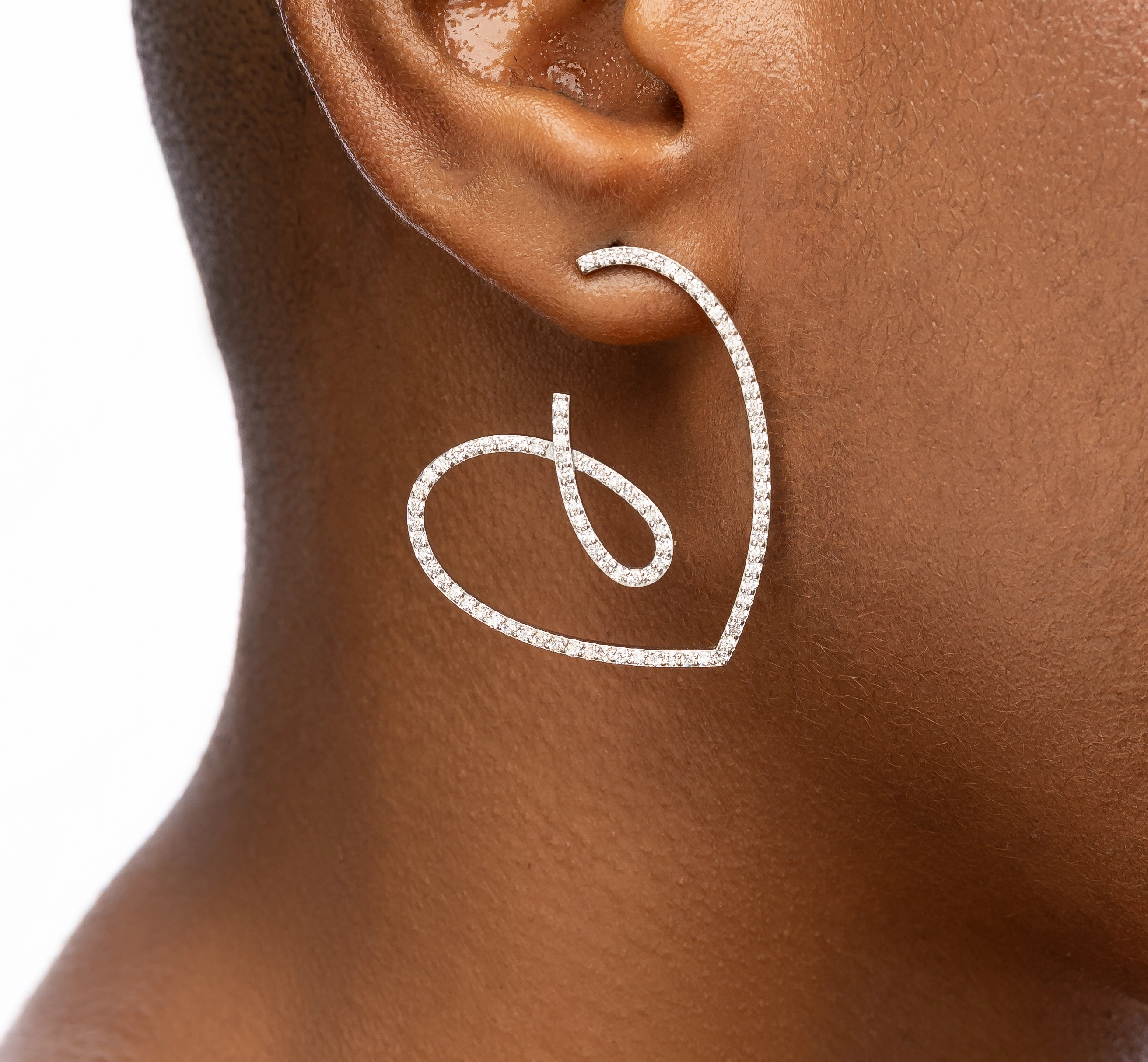 Side view of Big Love Shaped Earrings showing dimensional design