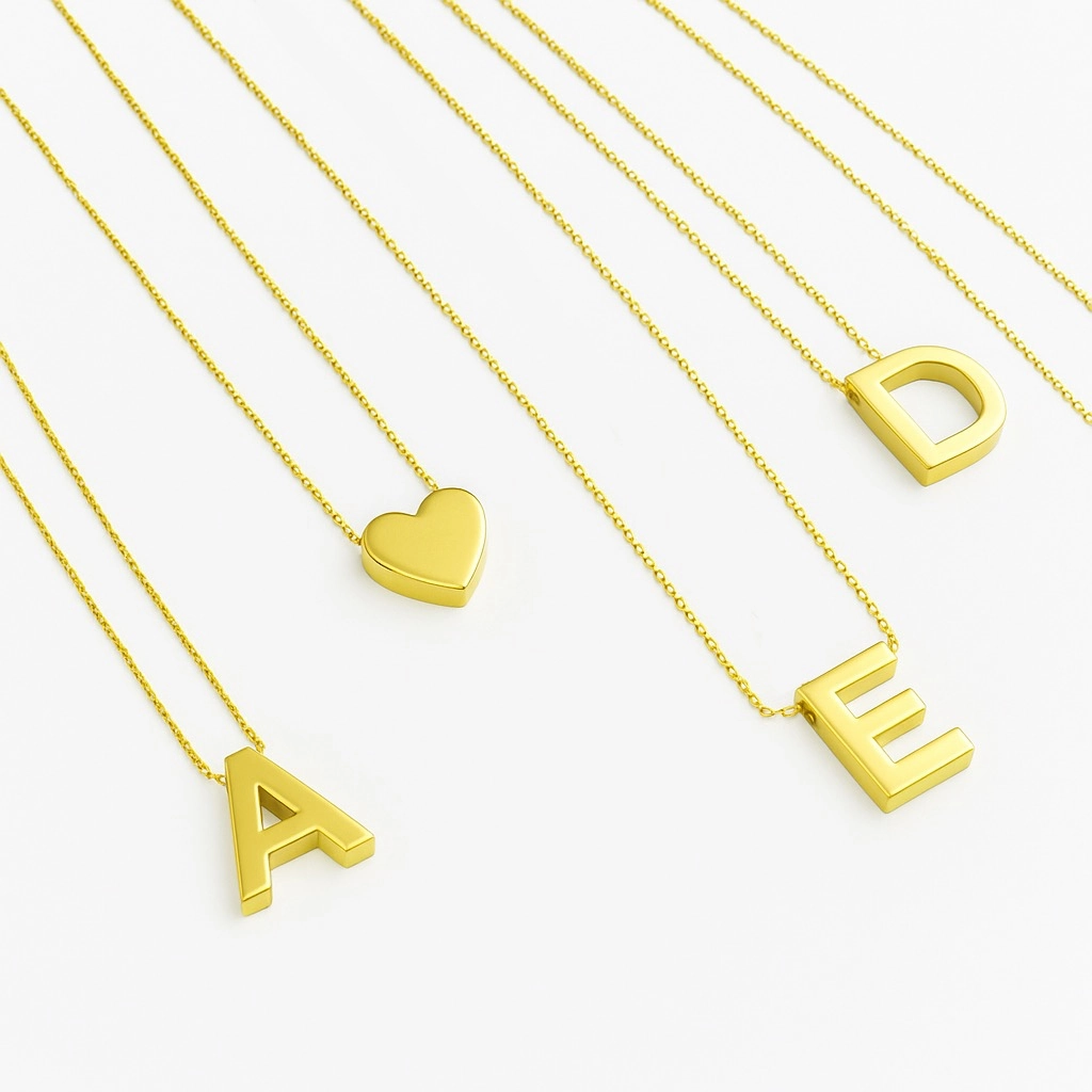 Yellow gold initial pendant with matching chain, perfect for everyday wear