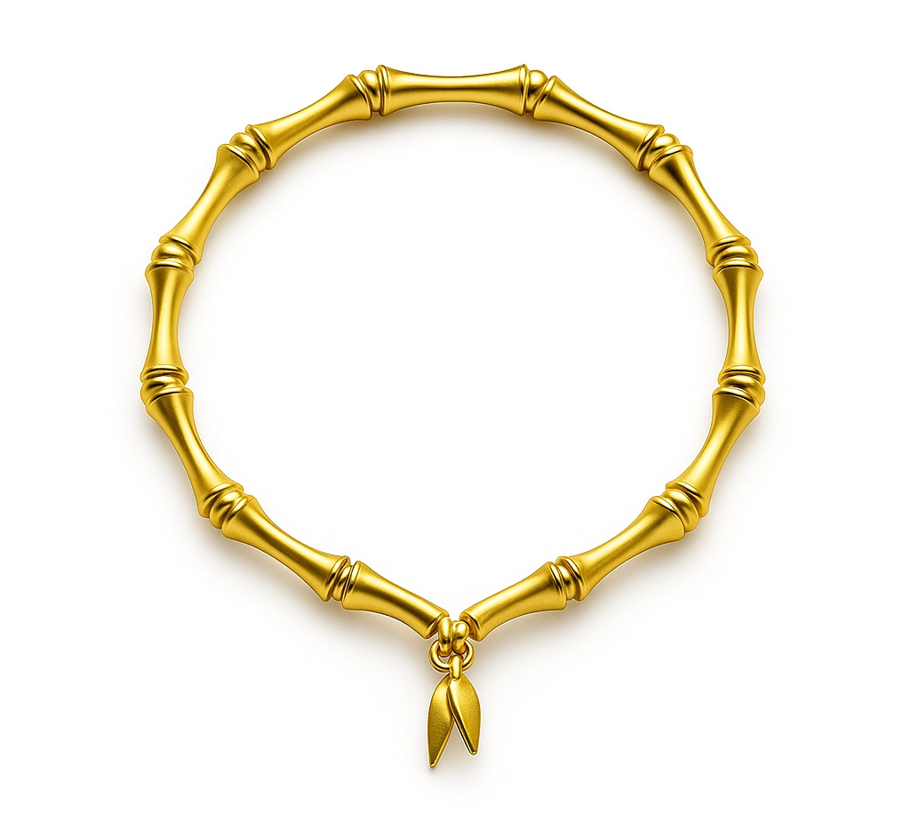 Close-up of 24K gold bamboo bead design with adjustable clasp