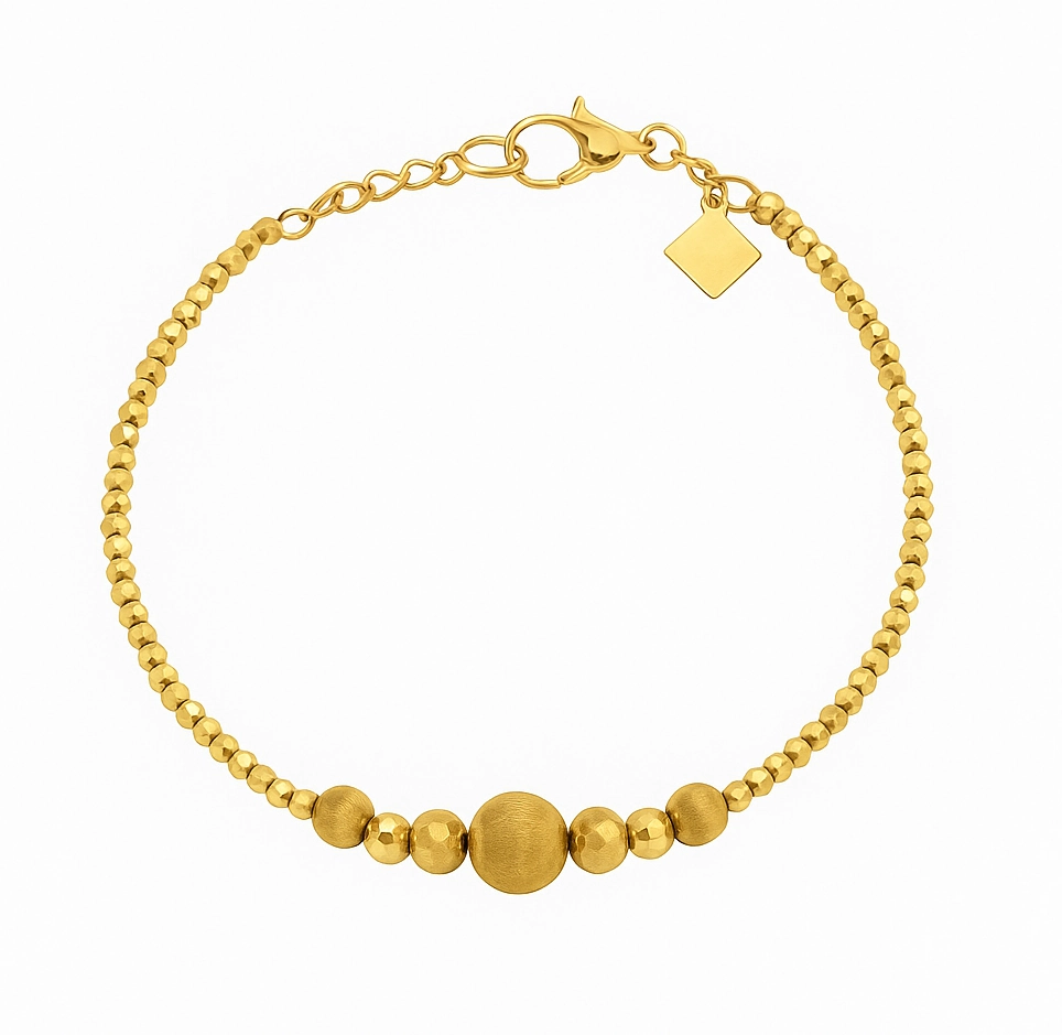 Minimalist 18K gold bead bangle with simple, elegant design