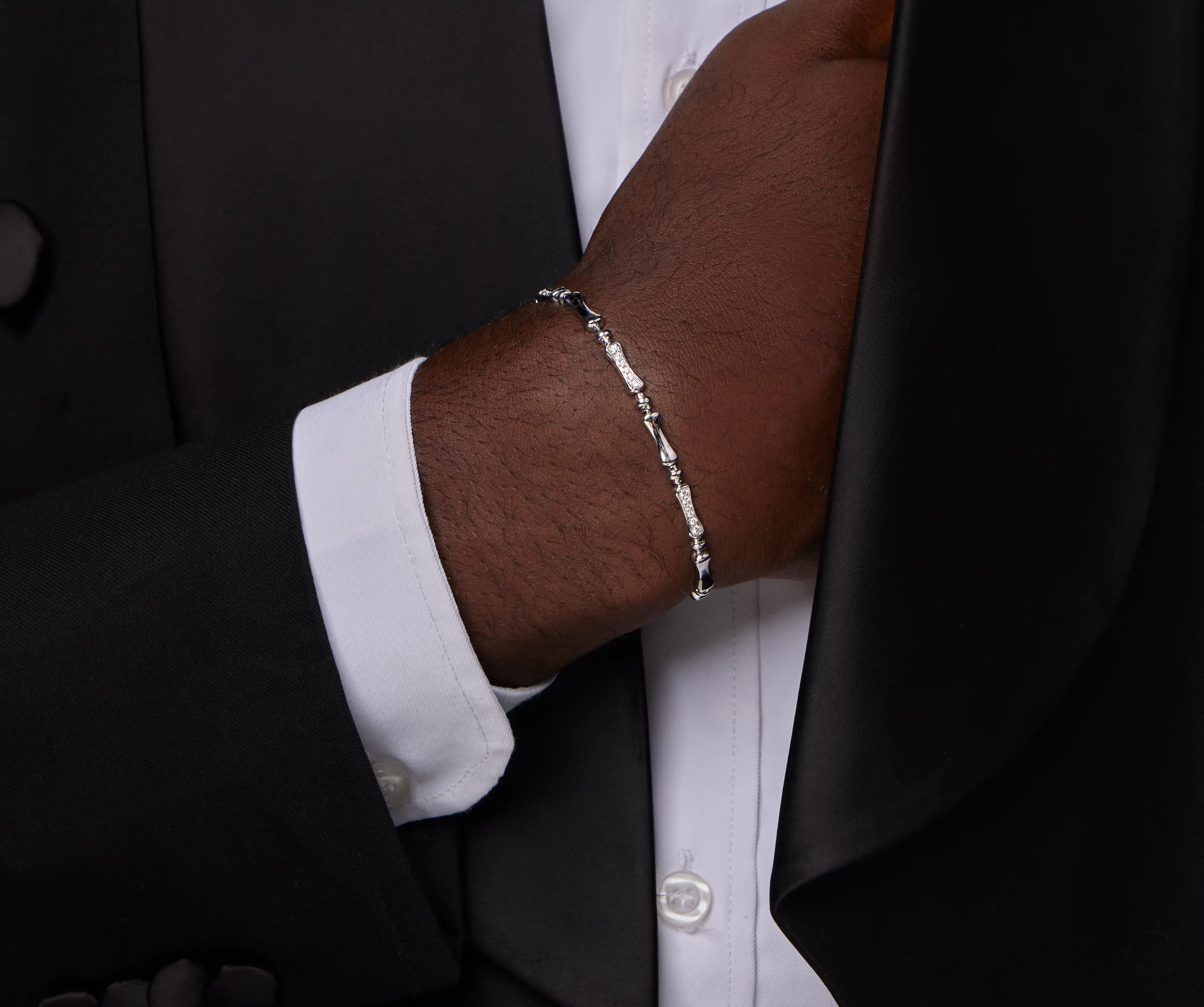 Detailed close-up of bamboo-inspired links and clasp mechanism